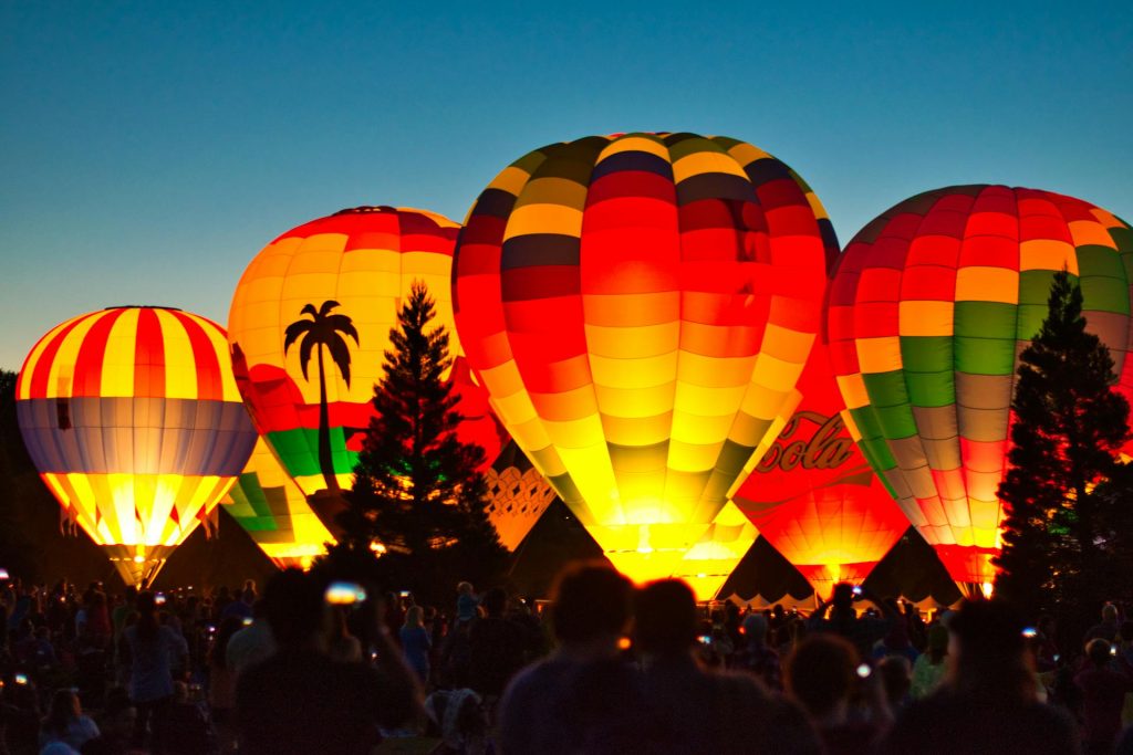 hot air balloons at sunset