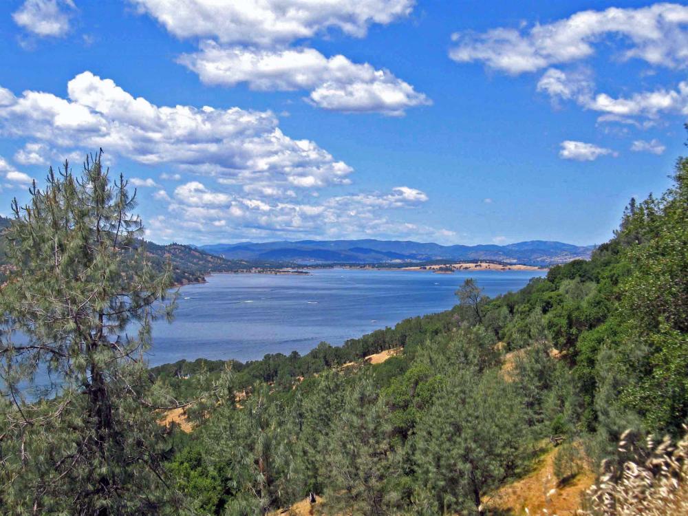 Lake Berryessa swimming area surrounded by hills in Napa