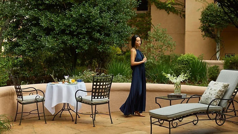 Guest relaxing on a private patio at a Sonoma Valley luxury resort