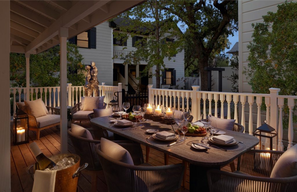 Outdoor candlelit dining patio at a Sonoma Valley luxury hotel in the evening